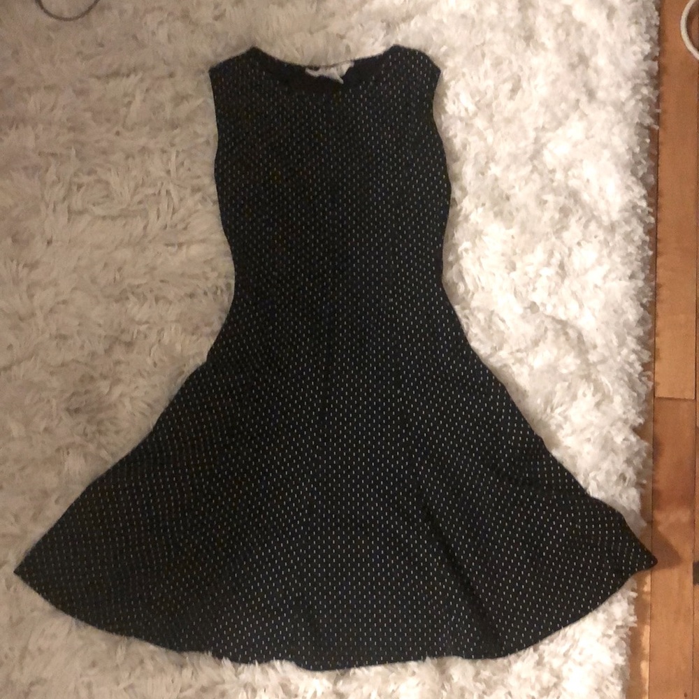 Polka dot express tricot sleeveless flared dress.
